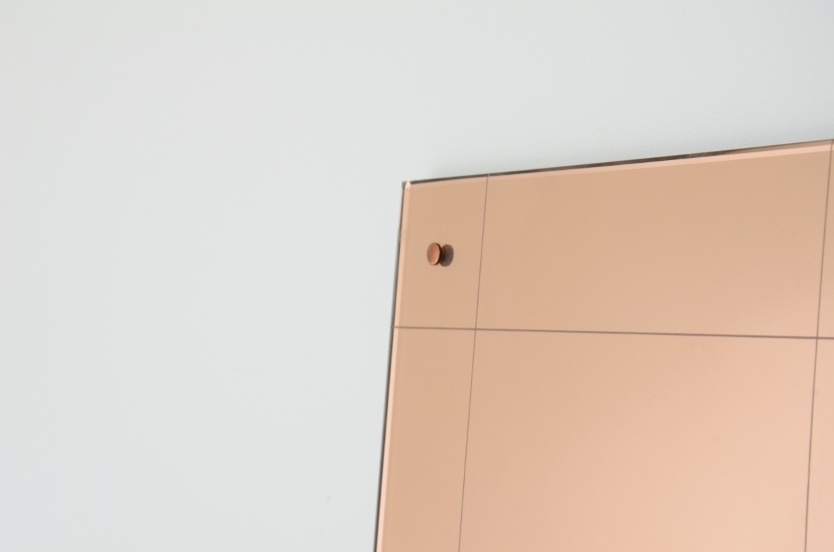 Powder pink mirror with burin engraved motif.  Italian manufacture from the 1940s