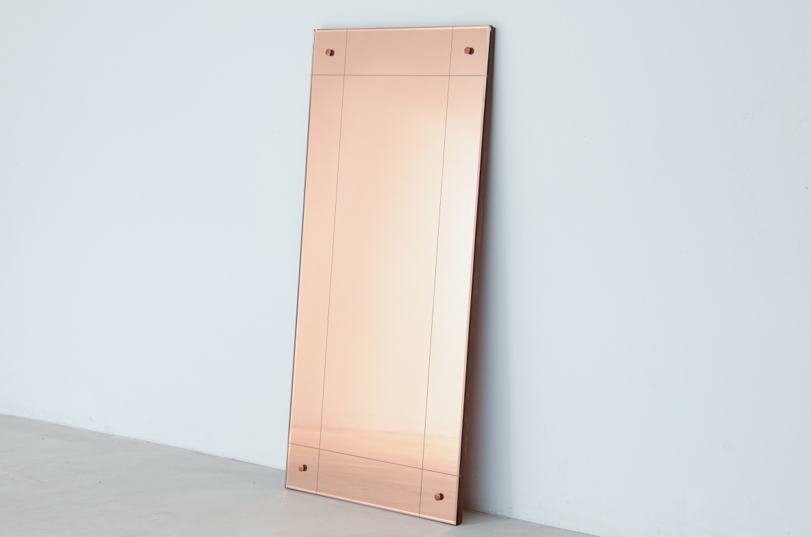 Powder pink mirror with burin engraved motif.  Italian manufacture from the 1940s