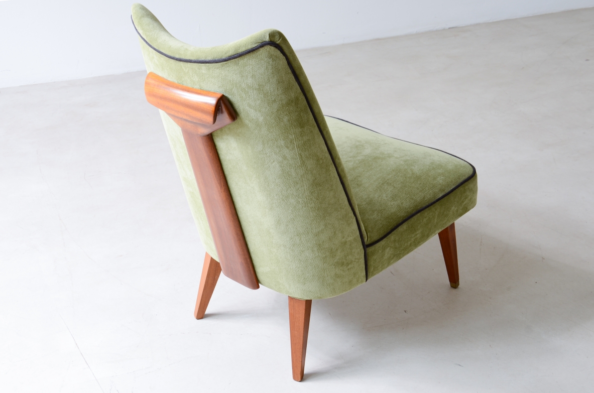 Melchiorre Bega, Rare pair of armchairs covered in velvet with wooden handle on the backrest.