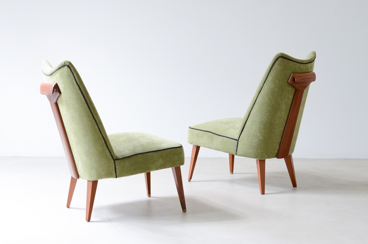 Melchiorre Bega, Rare pair of armchairs covered in velvet with wooden handle on the backrest.