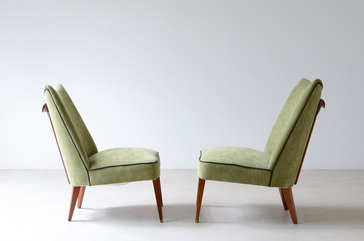 Melchiorre Bega, Rare pair of armchairs covered in velvet with wooden handle on the backrest.