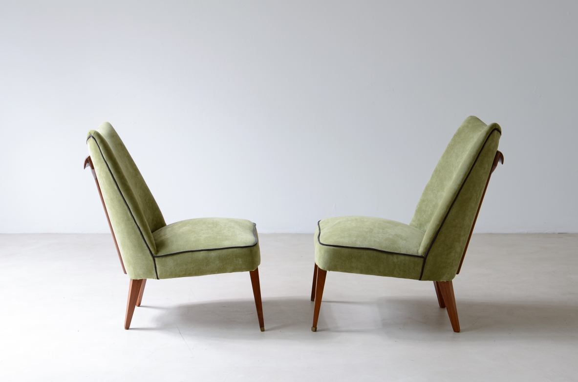 Melchiorre Bega, Rare pair of armchairs covered in velvet with wooden handle on the backrest.