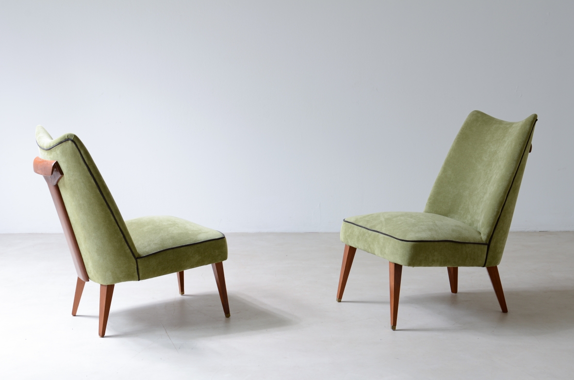 Melchiorre Bega, Rare pair of armchairs covered in velvet with wooden handle on the backrest.