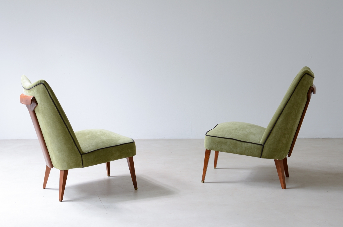 Melchiorre Bega, Rare pair of armchairs covered in velvet with wooden handle on the backrest.