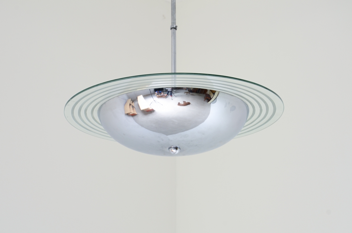 Chromed metal chandelier with cut and engraved crystal disc.  Italian manufacture ca. 1960.