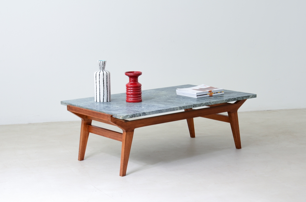 Ico Parisi Shaped wooden living room table with green Alps marble top.