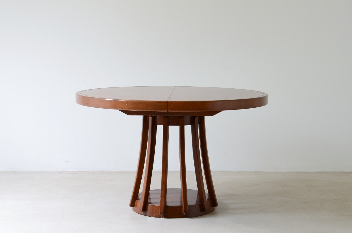 Angelo Mangiarotti Extendable walnut table, designed in 1972. Round pedestal. La Sorgente Furniture production,1972.