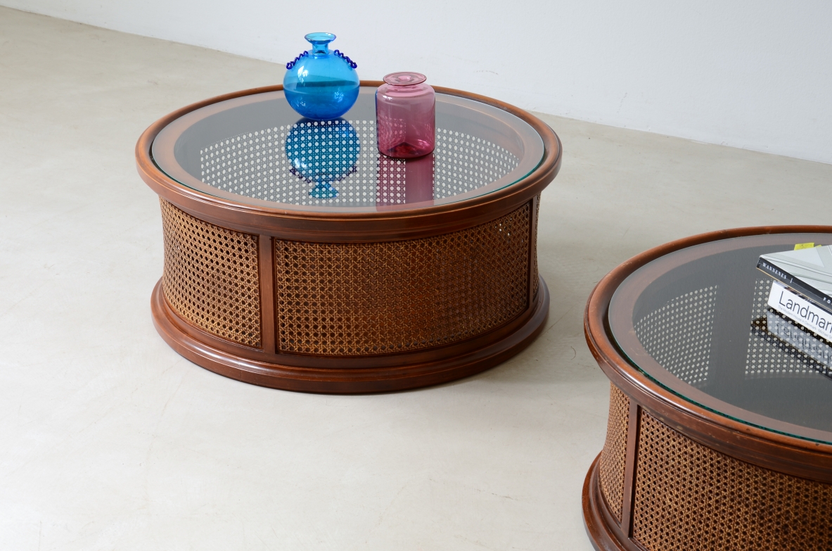 Pair of round tables in wood and Vienna straw with glass top.  Italian 1970s manufacture.