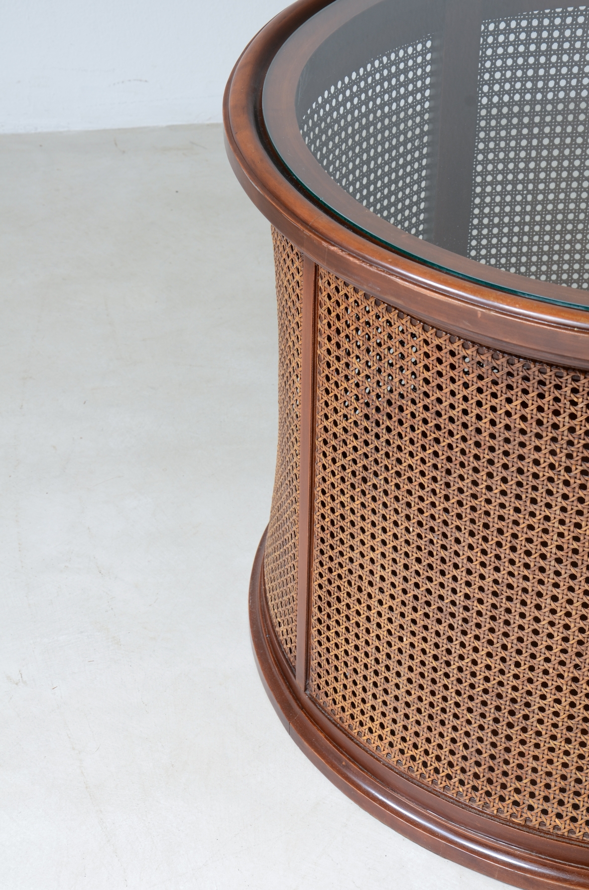 Round coffee table in wood and Vienna straw with glass top.  Italian 1970s manufacture.