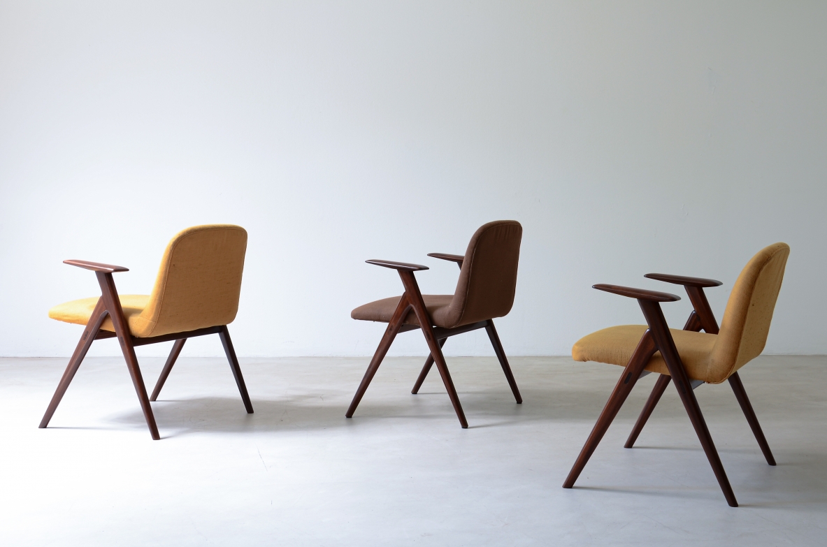 Luigi Vietti Six elegant armchairs in wood and padded fabric.1960's