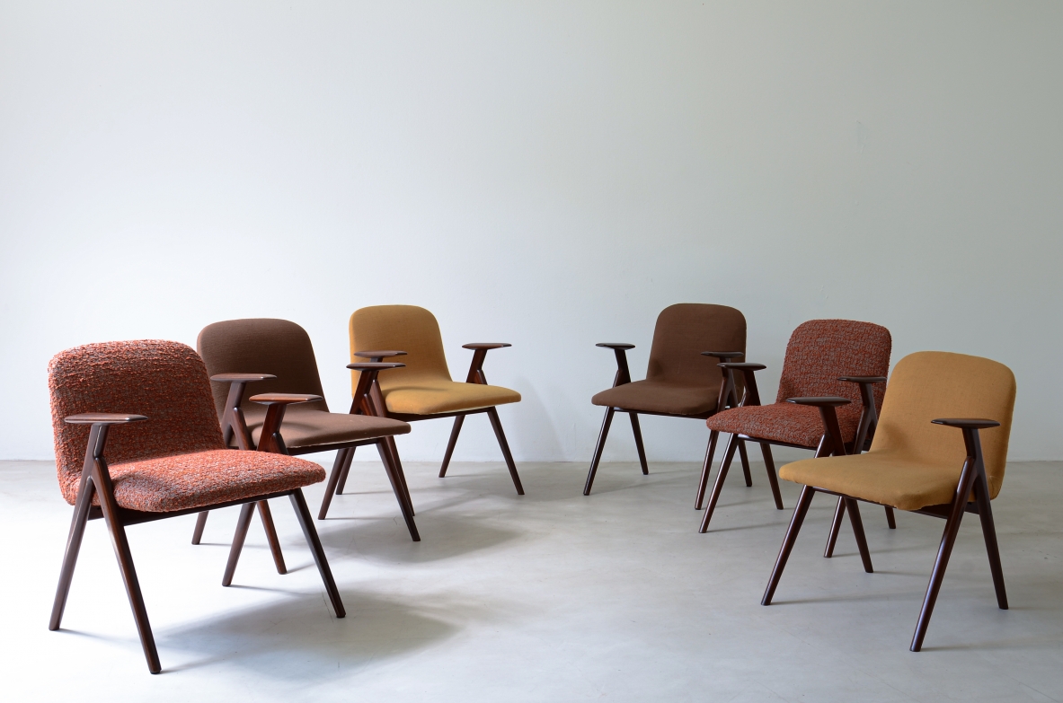 Luigi Vietti Six elegant armchairs in wood and padded fabric.1960's