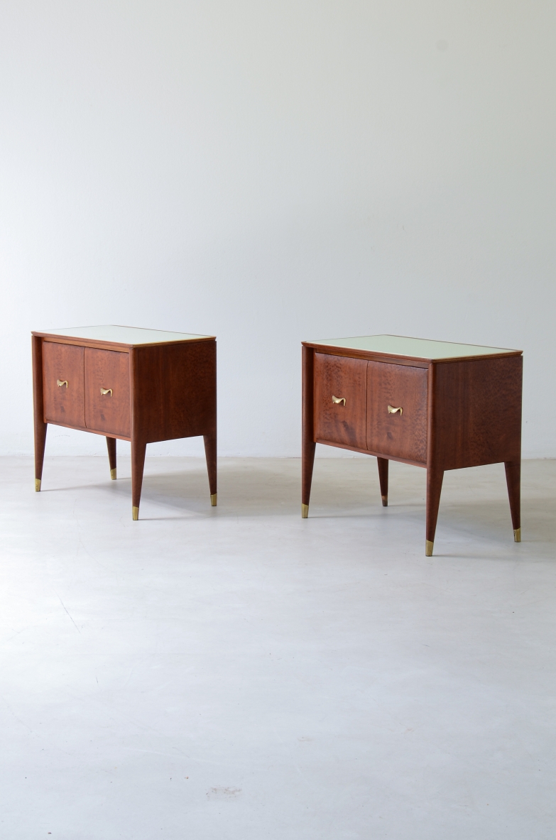Pair of bedside tables with tapered legs, brass tips and handles 1950's