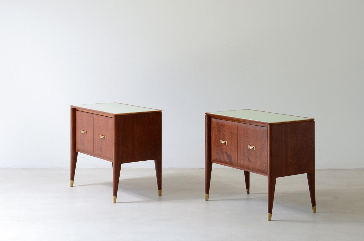 Pair of bedside tables with tapered legs, brass tips and handles 1950's
