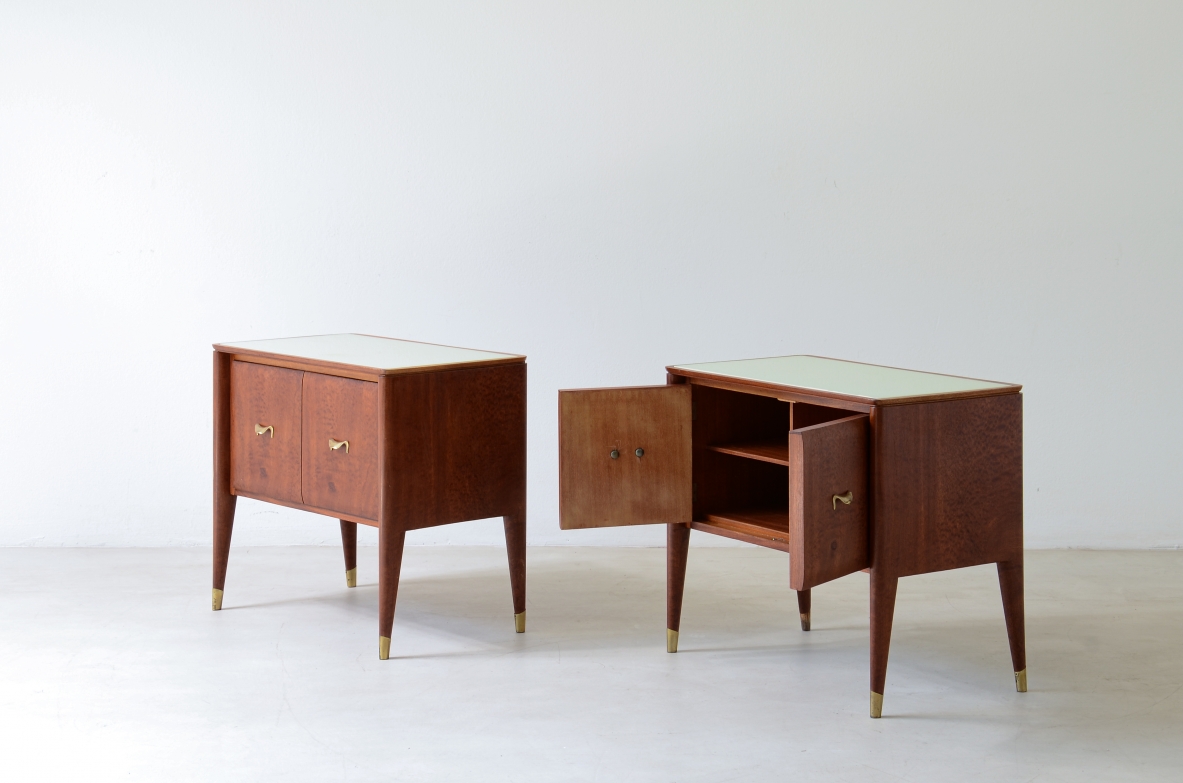 Pair of bedside tables with tapered legs, brass tips and handles 1950's