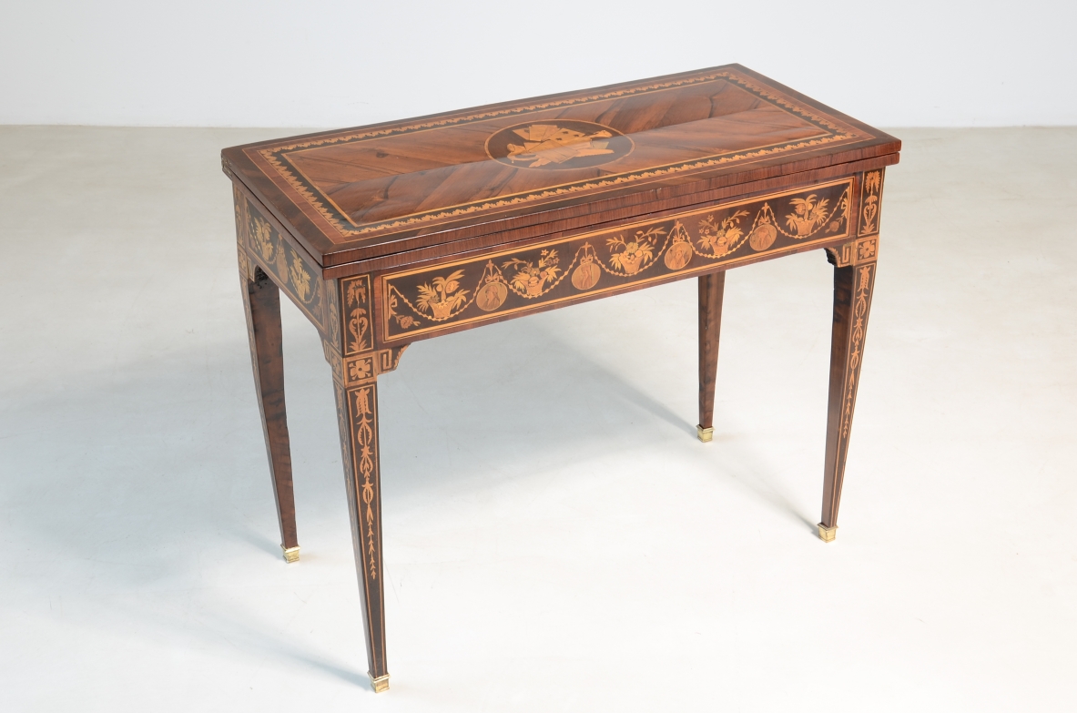 Elegant gaming table with inlay designs.North italian manufacture, Louis XVI era. 1780ca.