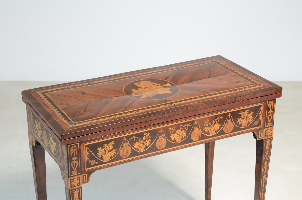 Elegant gaming table with inlay designs.North italian manufacture, Louis XVI era. 1780ca.