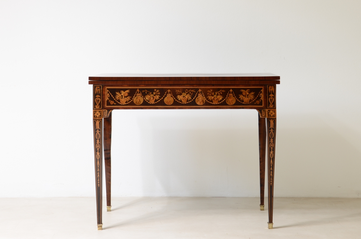 Elegant gaming table with inlay designs.North italian manufacture, Louis XVI era. 1780ca.