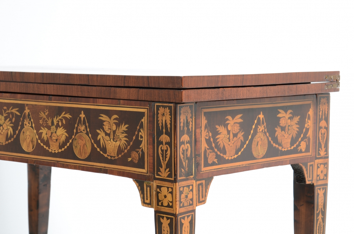 Elegant gaming table with inlay designs.North italian manufacture, Louis XVI era. 1780ca.