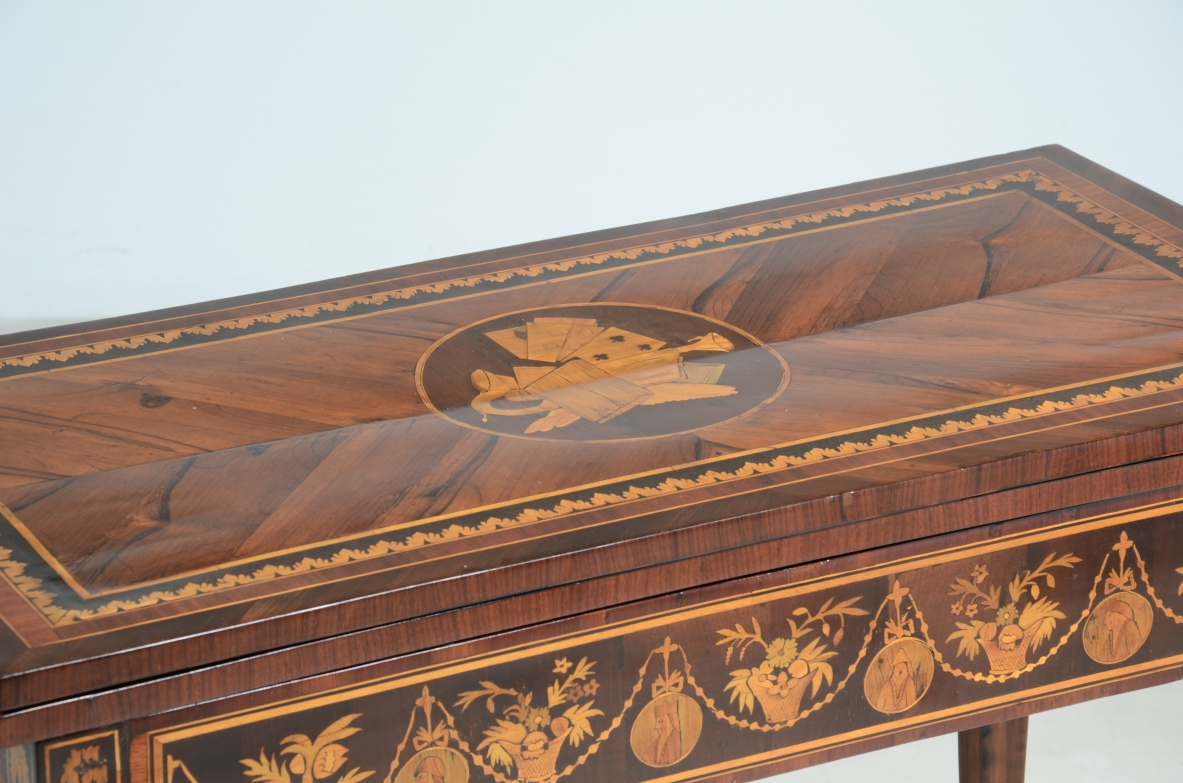 Elegant gaming table with inlay designs.North italian manufacture, Louis XVI era. 1780ca.