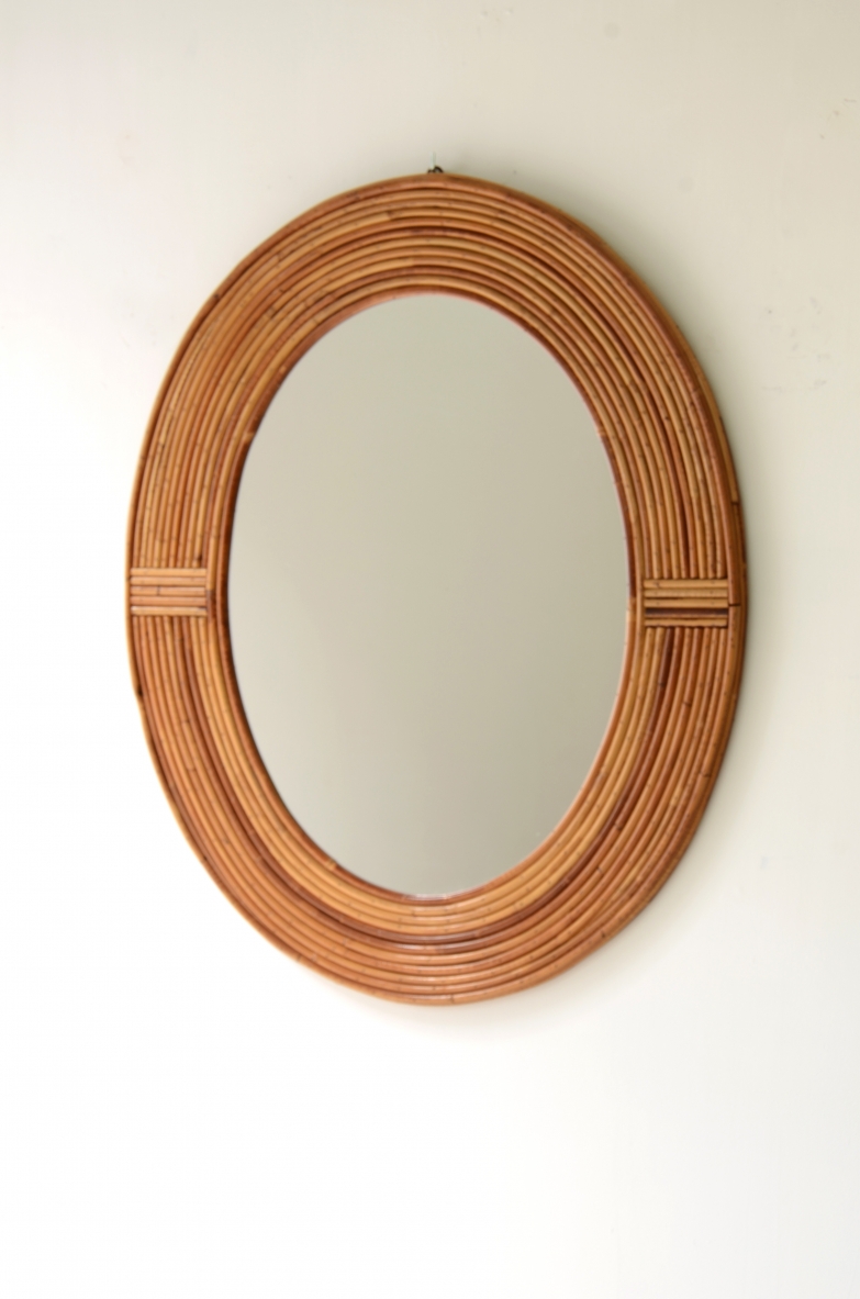 Vivai del Sud  Specchio tropicalista di forma ovale in rattan.