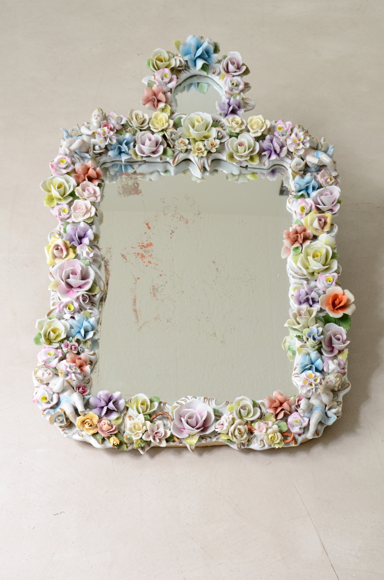 Mirror with important polychrome flower porcelain frame. Capodimonte manufacture