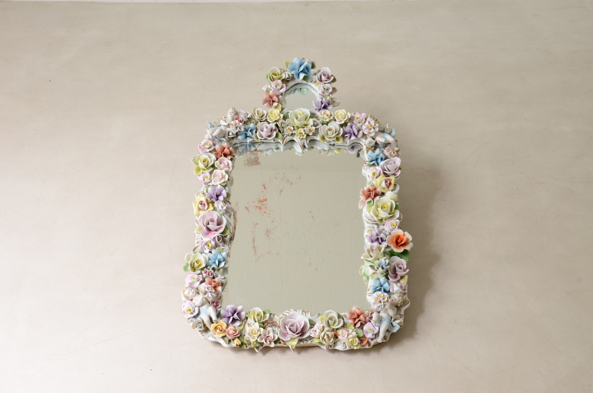 Mirror with important polychrome flower porcelain frame. Capodimonte manufacture