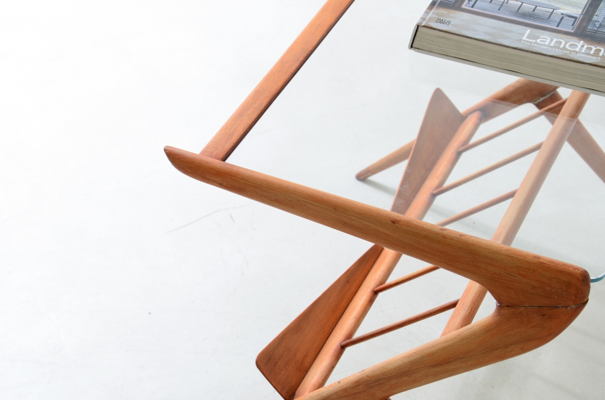 Elegant cherry wood coffee table with magazine rack, Italian manufacture, ca.1950.