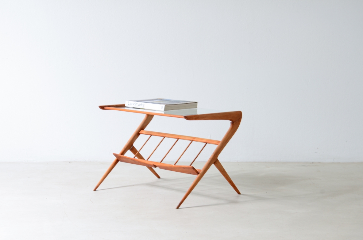 Elegant cherry wood coffee table with magazine rack, Italian manufacture, ca.1950.