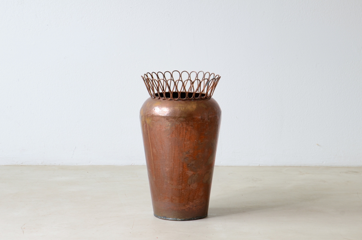Gio Ponti  Turned copper umbrella stand with continuous ribbon crown.