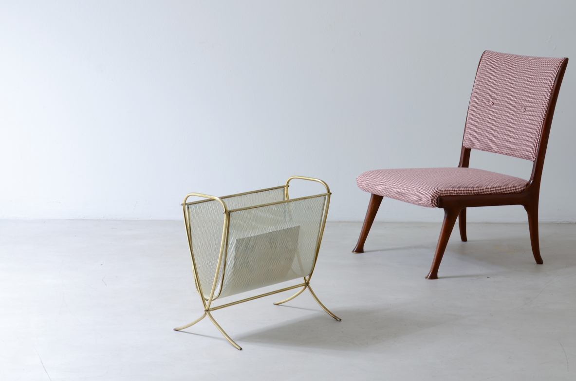 Magazine rack in perforated metal and brass.  Italian manufacture 1950.