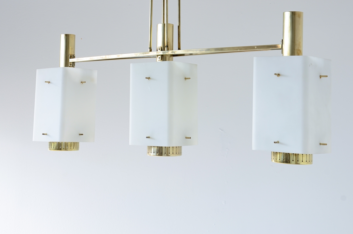 Stilnovo Elegant three-light chandelier in brass with opaline glass pendants. Bruno Gatta 1950