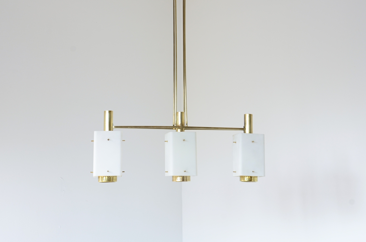 Stilnovo Elegant three-light chandelier in brass with opaline glass pendants. Bruno Gatta 1950