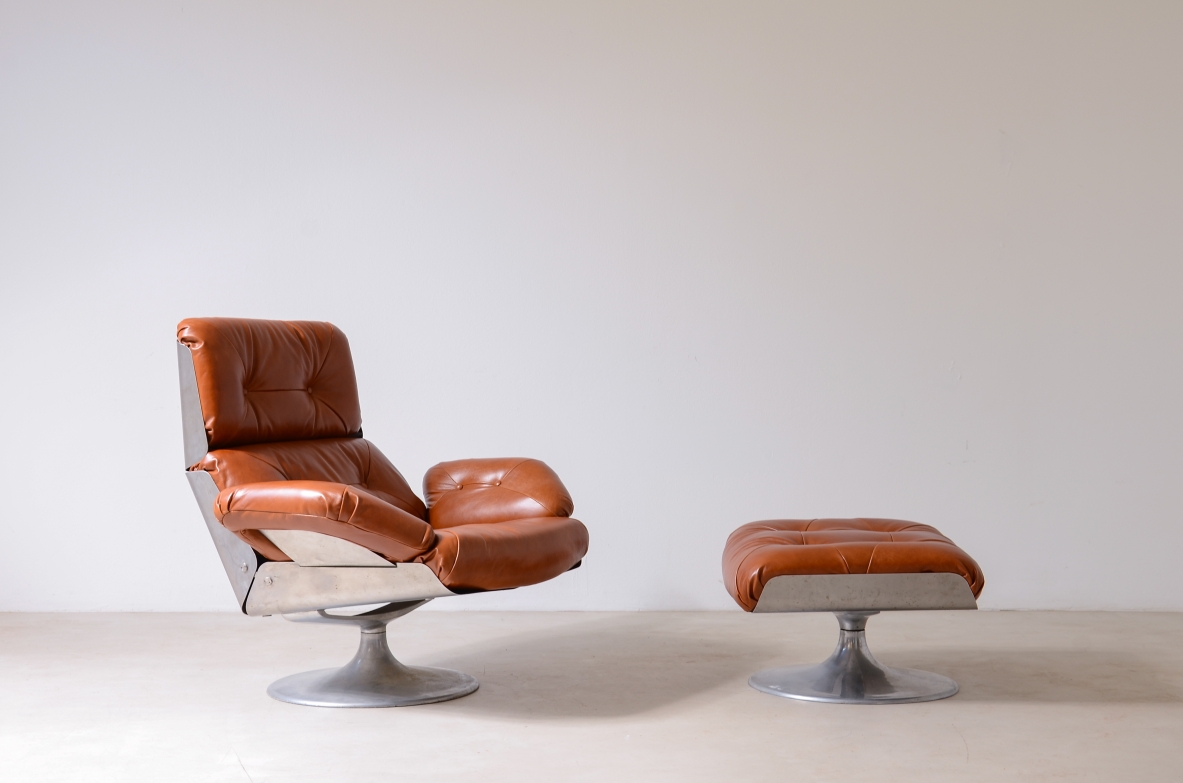 Xavier Feal  Rare swivel chair with footrest in curved steel and leather upholstery.  Inox Industrie, France, ca. 1970.v