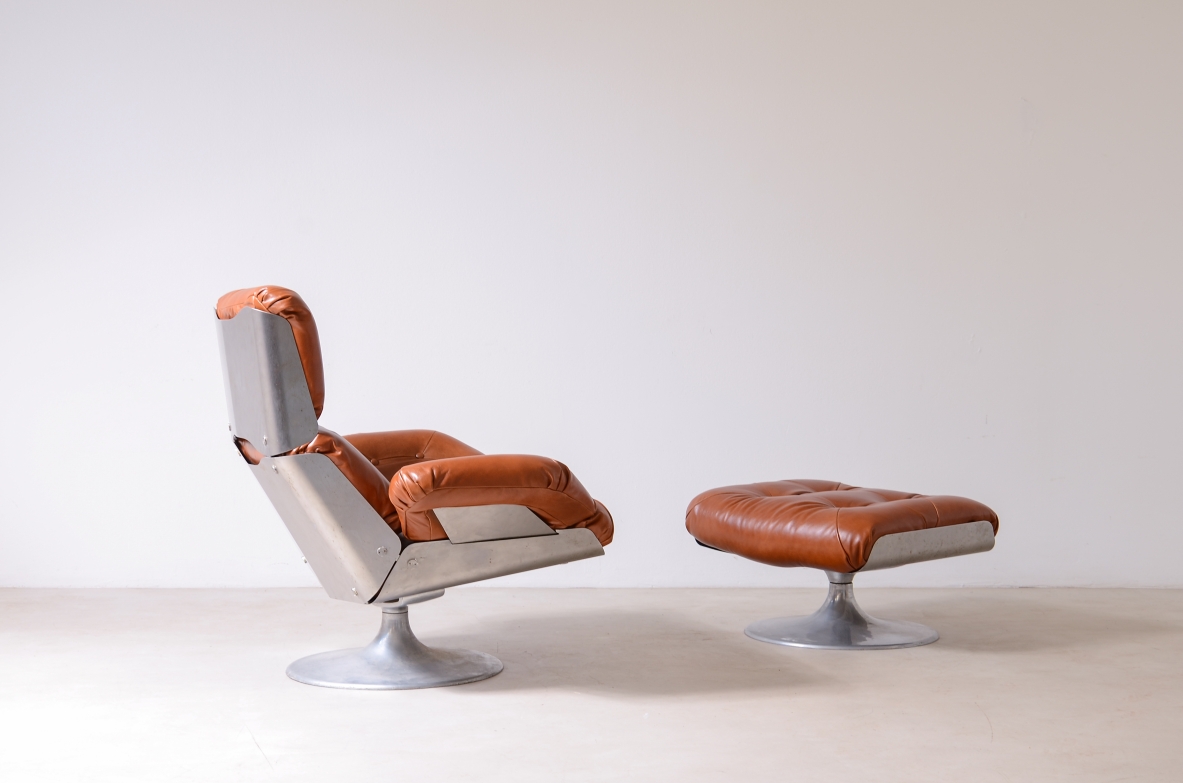 Xavier Feal  Rare swivel chair with footrest in curved steel and leather upholstery.  Inox Industrie, France, ca. 1970.v