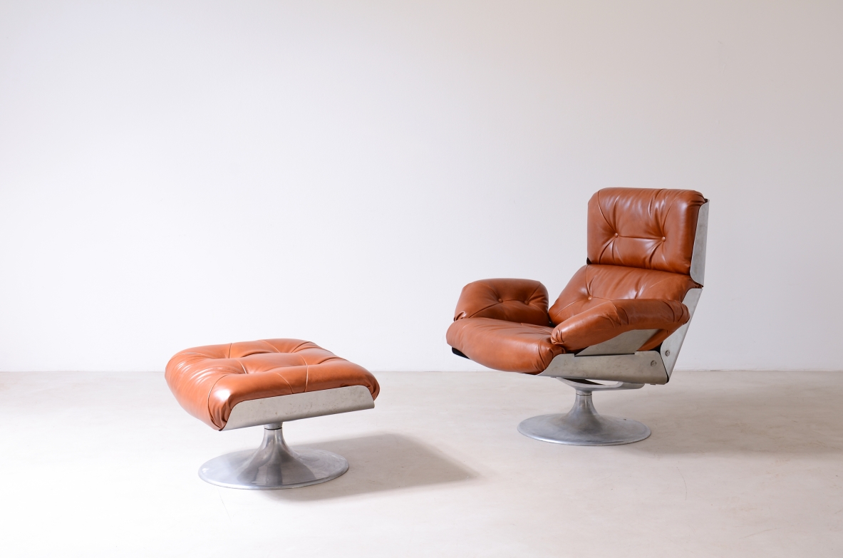 Xavier Feal  Rare swivel chair with footrest in curved steel and leather upholstery.  Inox Industrie, France, ca. 1970.v