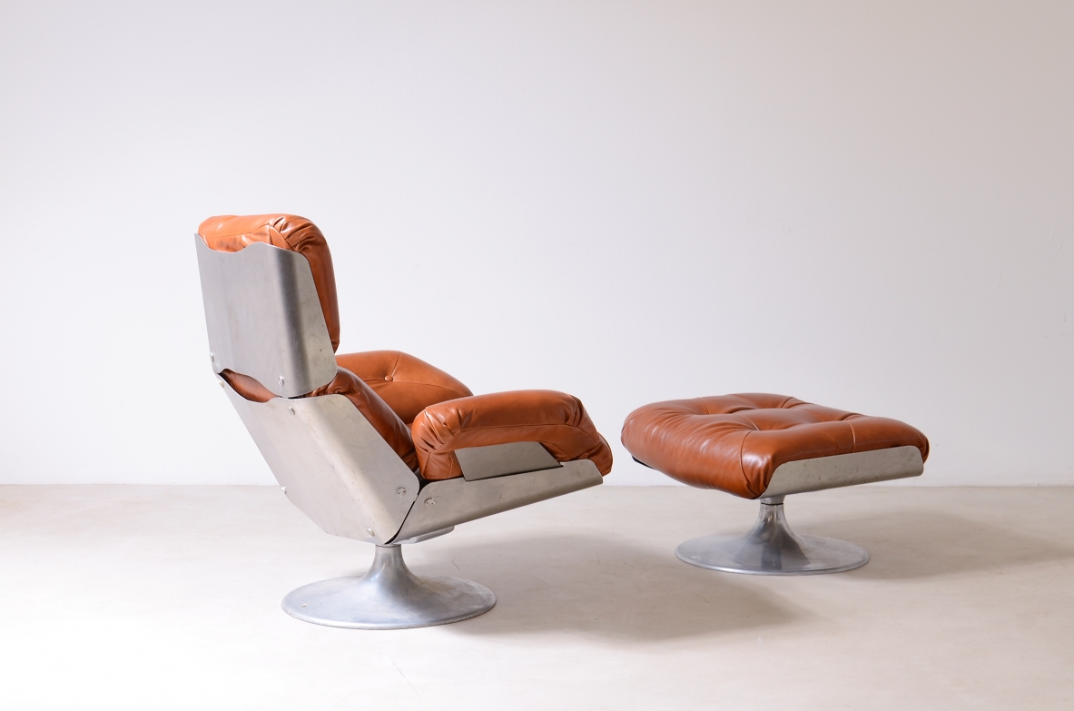 Xavier Feal  Rare swivel chair with footrest in curved steel and leather upholstery.  Inox Industrie, France, ca. 1970.v