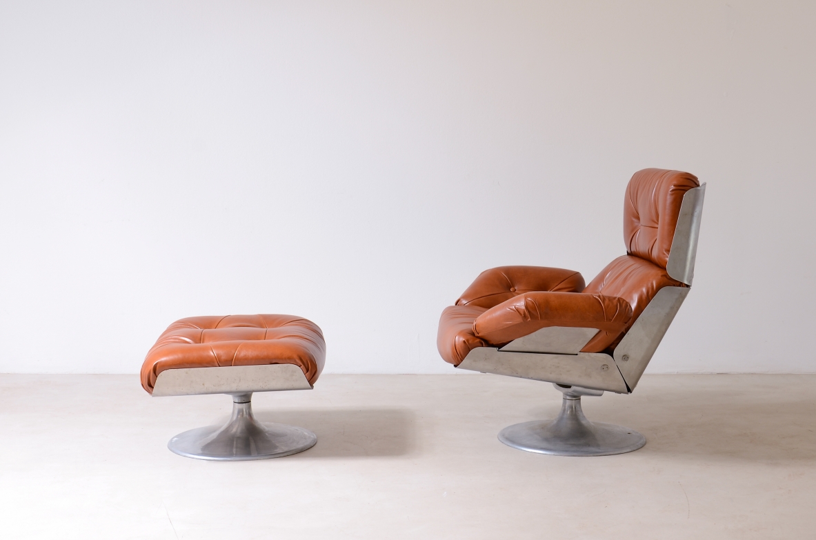 Xavier Feal  Rare swivel chair with footrest in curved steel and leather upholstery.  Inox Industrie, France, ca. 1970.v