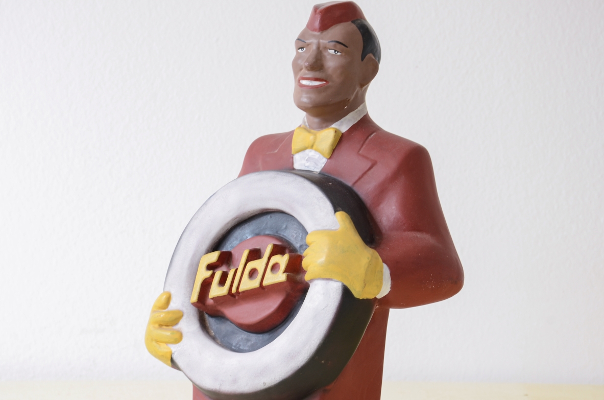 Plaster cast of 1950s advertisement.