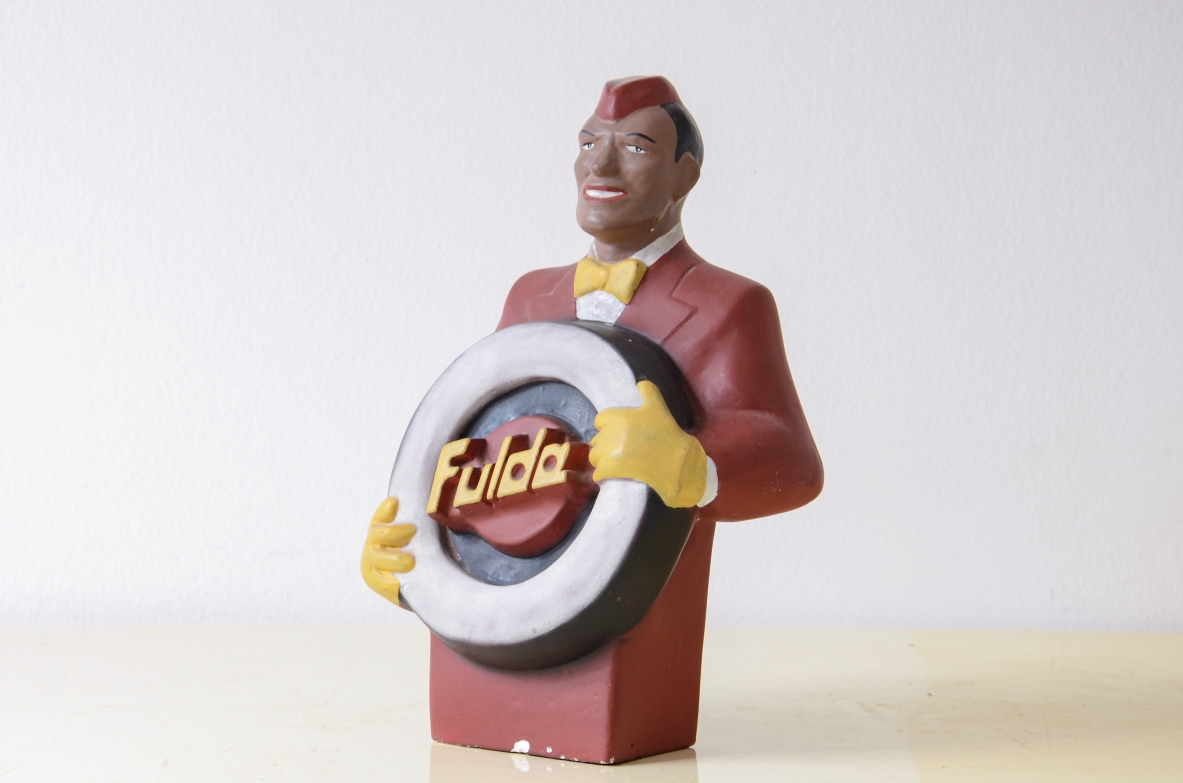 Plaster cast of 1950s advertisement.