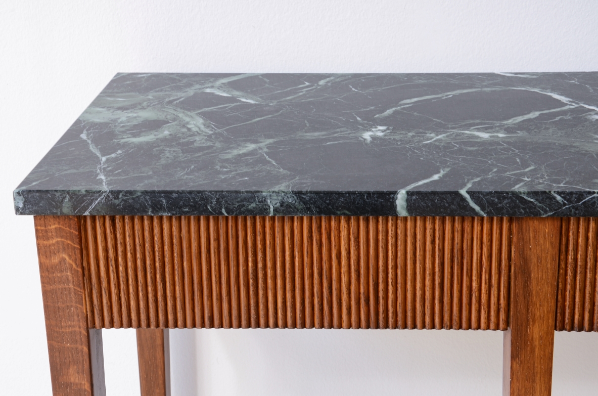 Paolo Buffa  Elegant console table in reeded Oak with a beautiful marble top.  1940's manufacturing