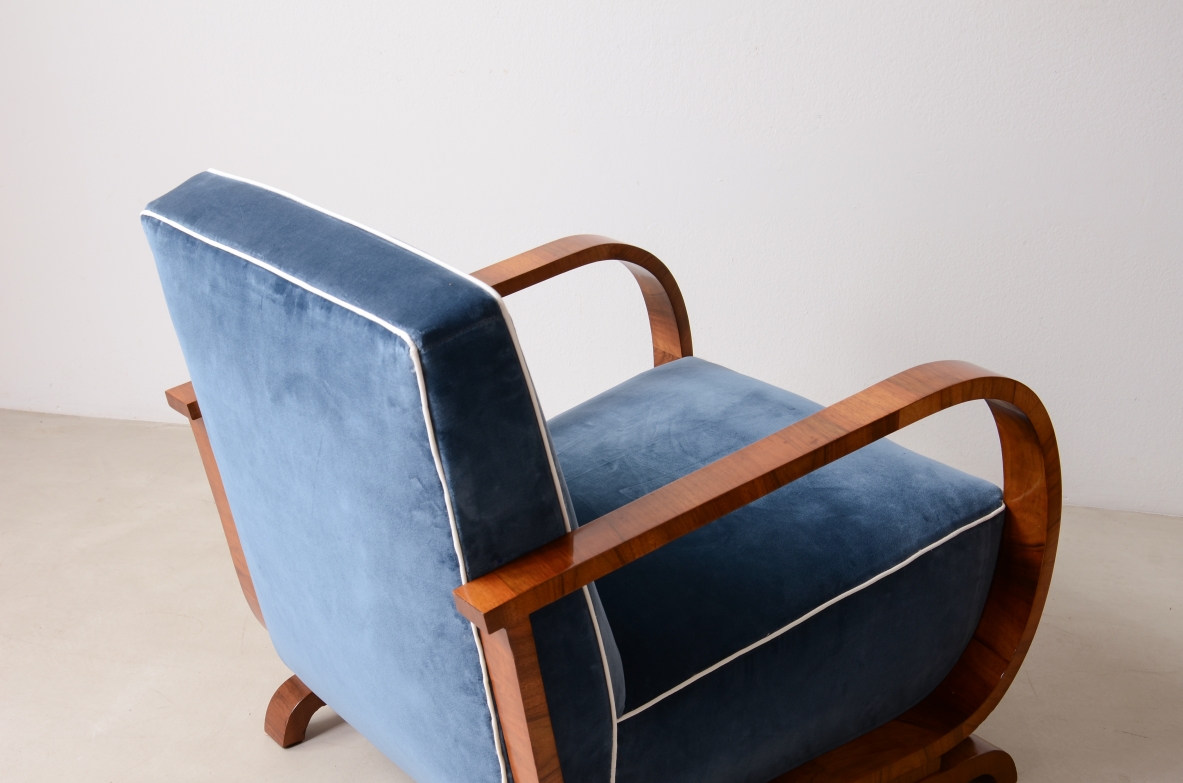 Pair of armchairs with curved wooden armrests and padded velvet seat.  Hungarian manufacture, 1930s-40s.
