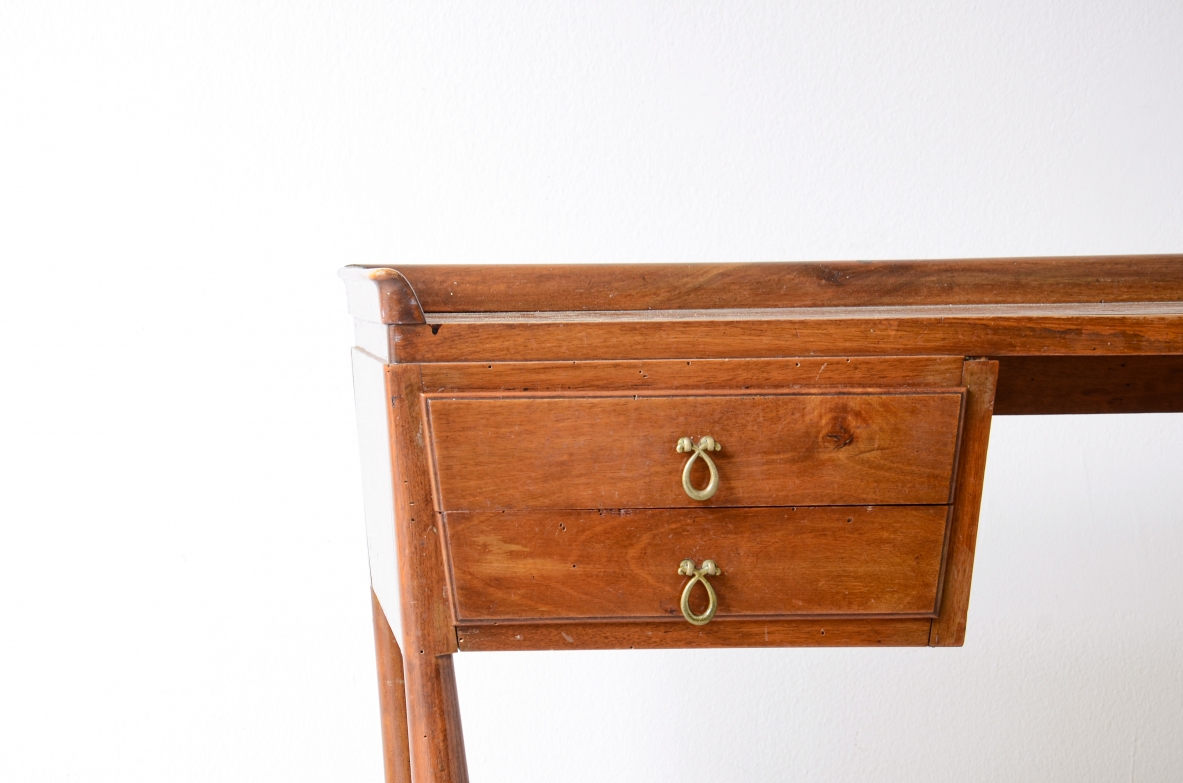 Guglielmo Ulrich  Elegant walnut writing desk with beautiful floor cross. Manufacturing ca. 1940.