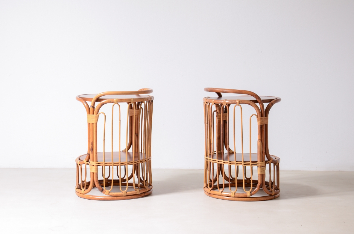 Pair of rattan nightstands with two wooden shelves.Italian manufacture 1960's
