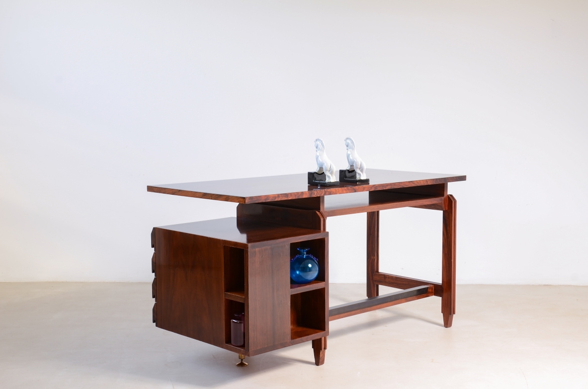 Elegant center desk with double top, four drawers and bookcase compartments.Italian manufacture, 1960s