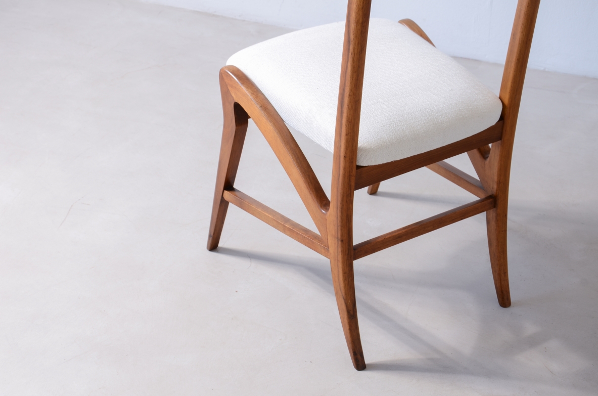 Pair of extraordinary oak chairs with upholstered fabric seat and back.  Attr. Guglielmo Pecorini, ca. 1940.