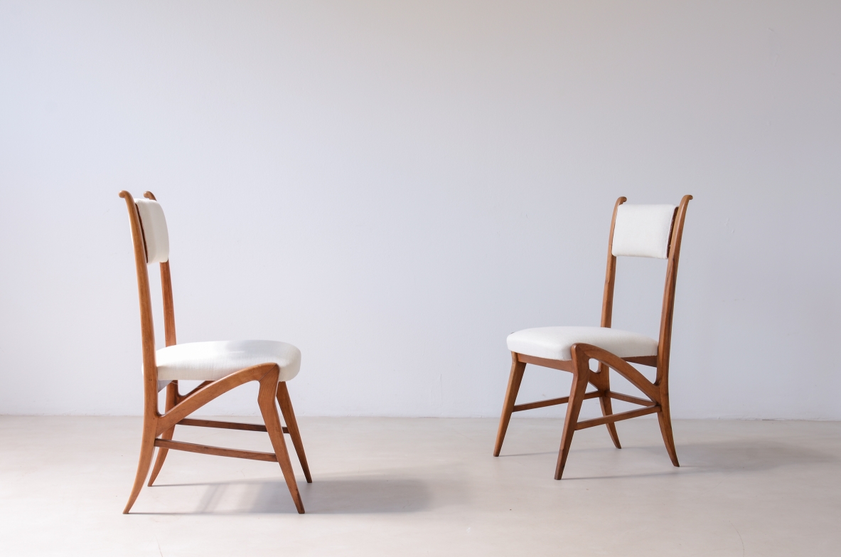 Pair of extraordinary oak chairs with upholstered fabric seat and back.  Attr. Guglielmo Pecorini, ca. 1940.