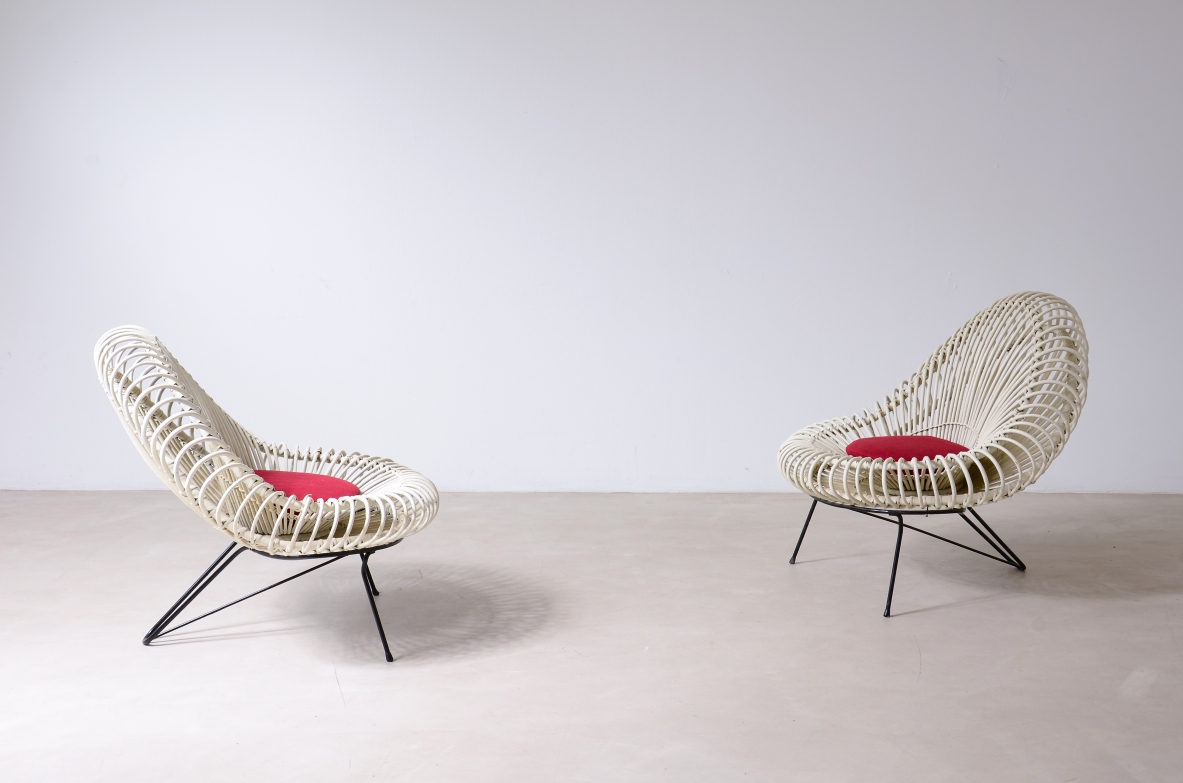 Janine Abraham & Dirk Jan Rol, pair of armchairs in lacquered rattan with metal supports. Prod. Edition Rougier, Holland, 1950ca.