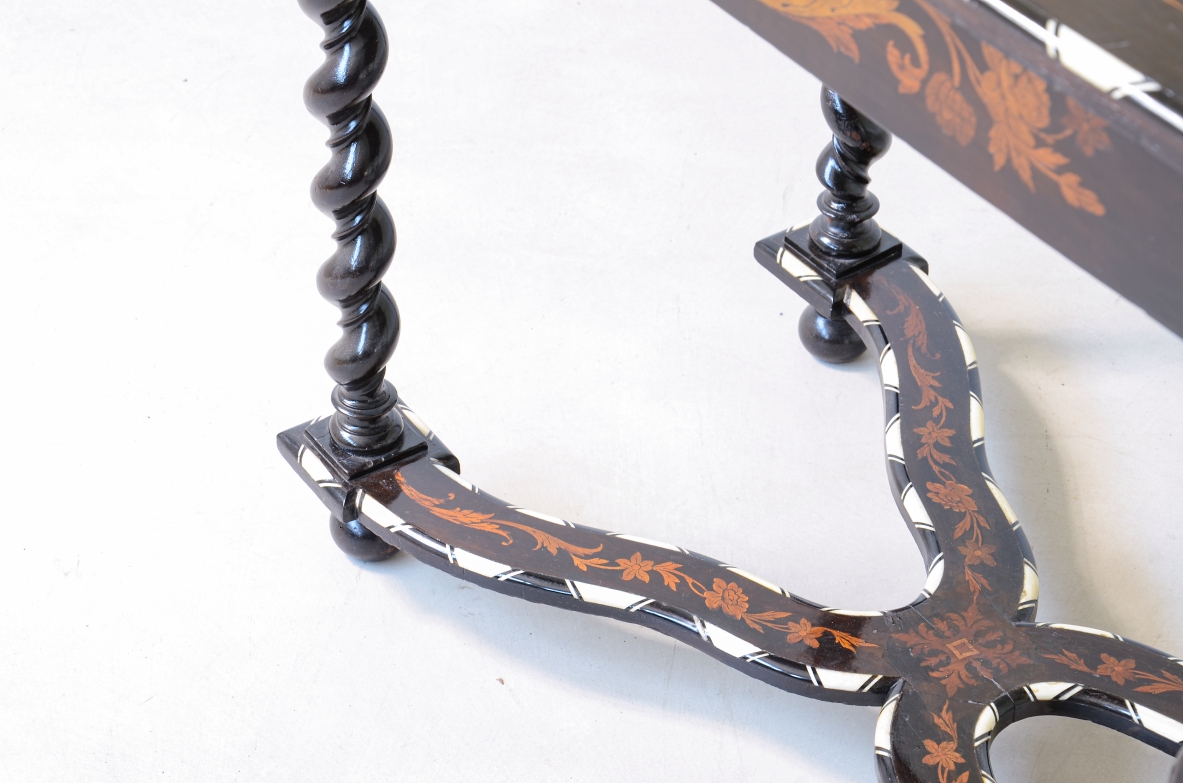 table finely inlaid in various woods and profiled in ivory 1850