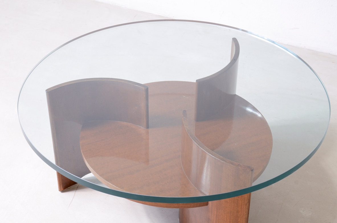 Elegant coffee table with base made up of 3 curved wooden supports 1960's