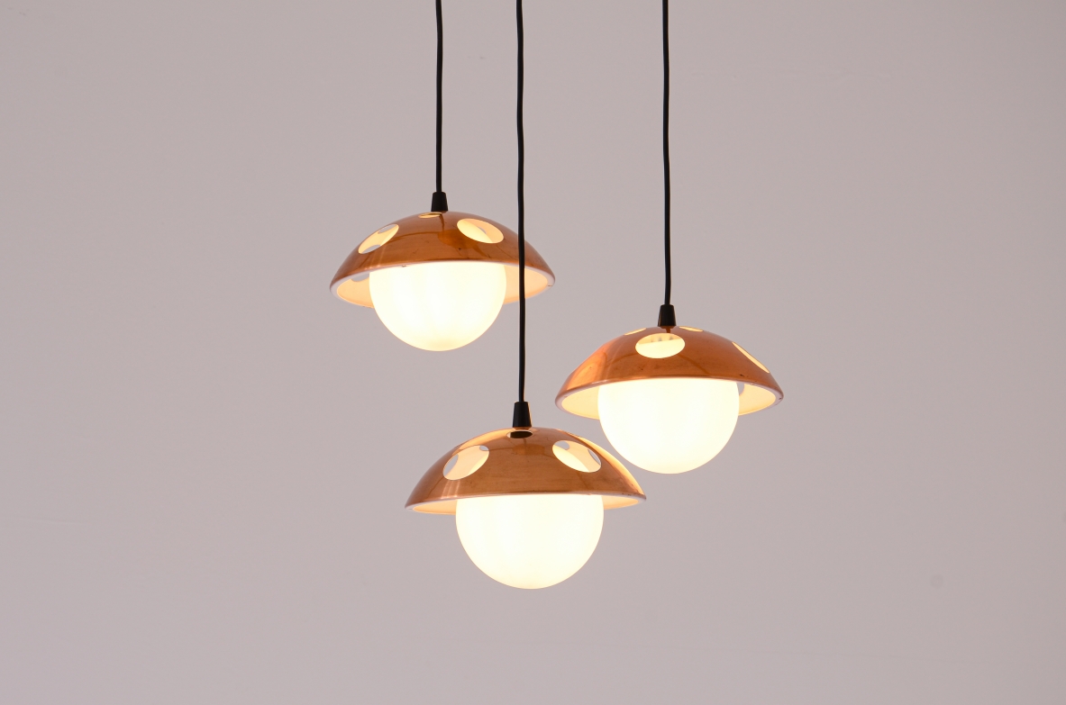 Small three-light chandelier with perforated copper shades 1960's